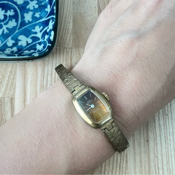 Vintage Jules Jurgensen ladies gold tone bronze tone mechanical dress watch main image 5